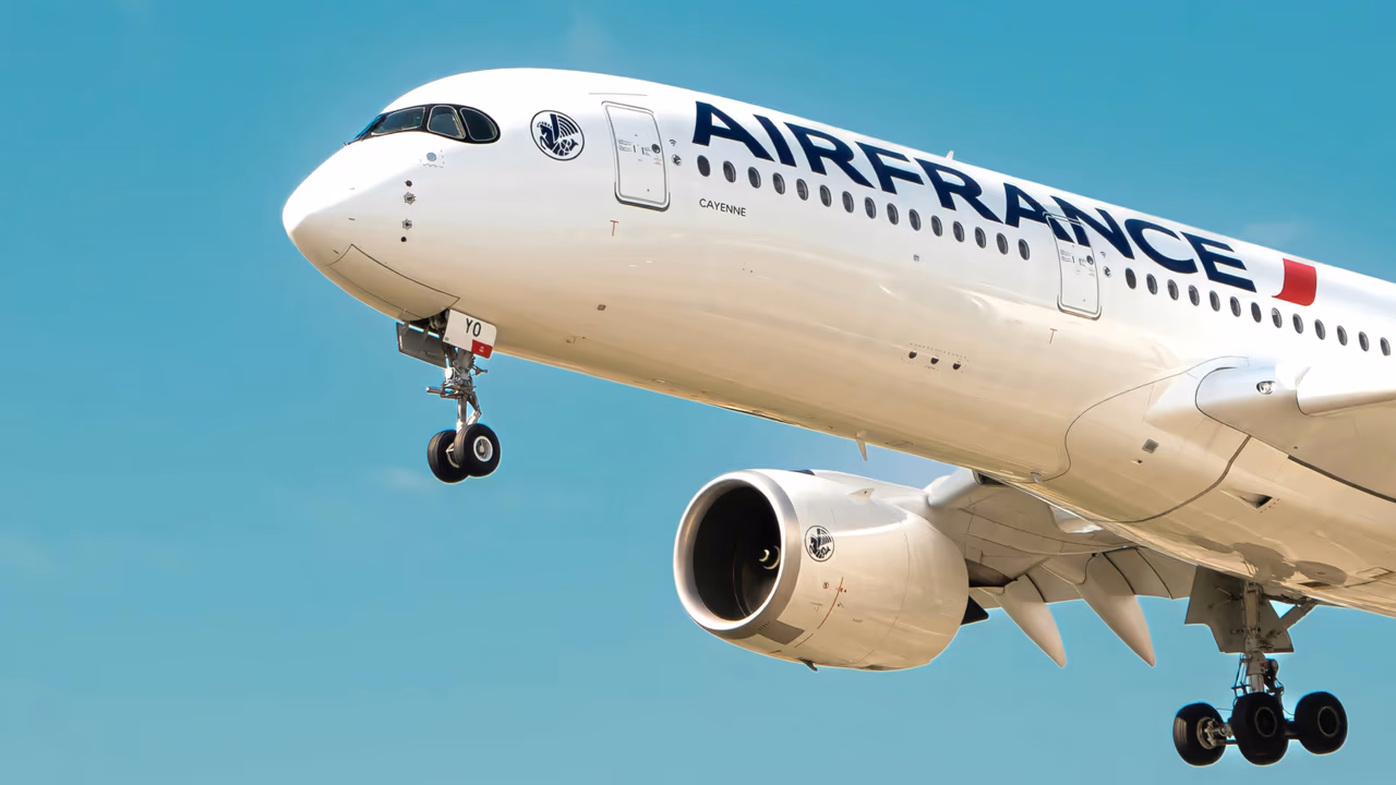 Air France airplane in the air with its landing gear down
