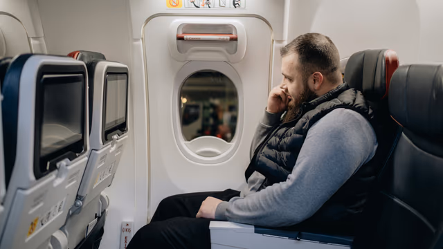 American Airlines Slashes Bonus Miles for Economy Flyers: What It Means for You