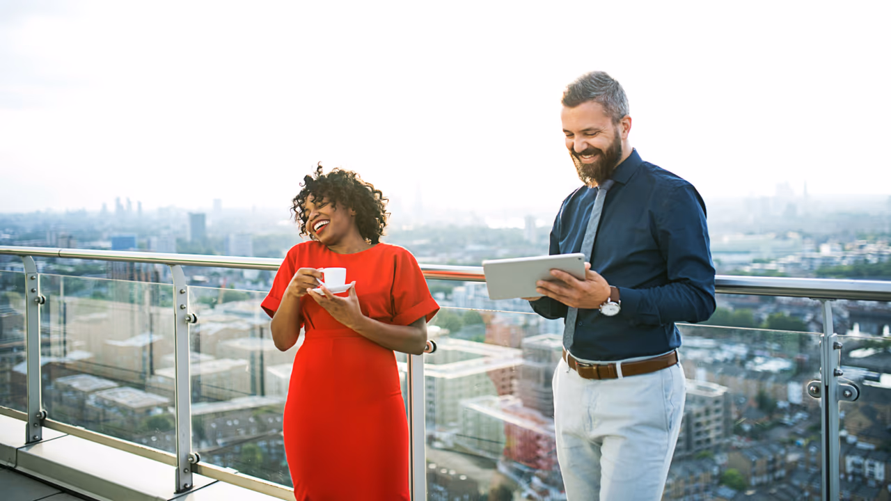 People laughing on a rooftop