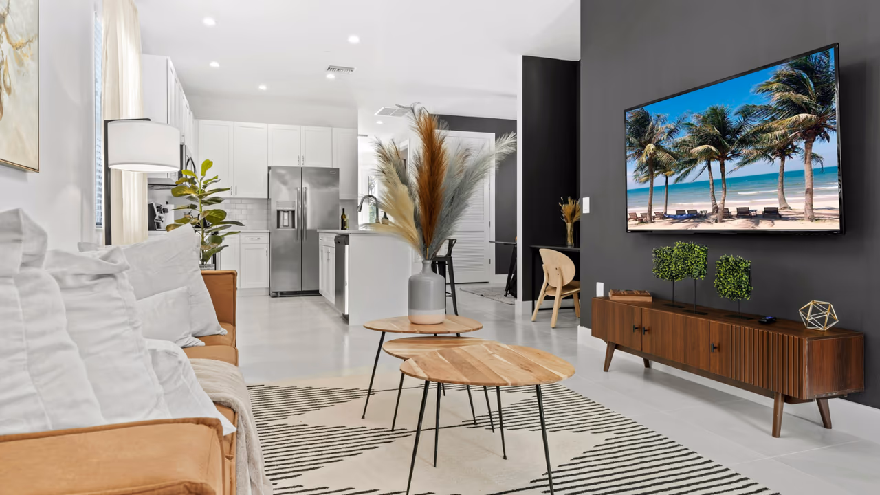 Modern Airbnb living room with open kitchen
