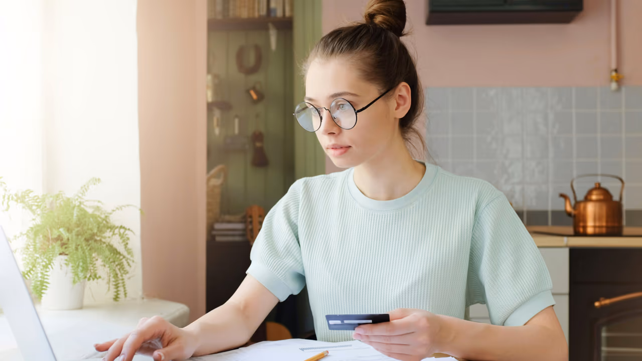 Paying utility bills online with a credit card at home