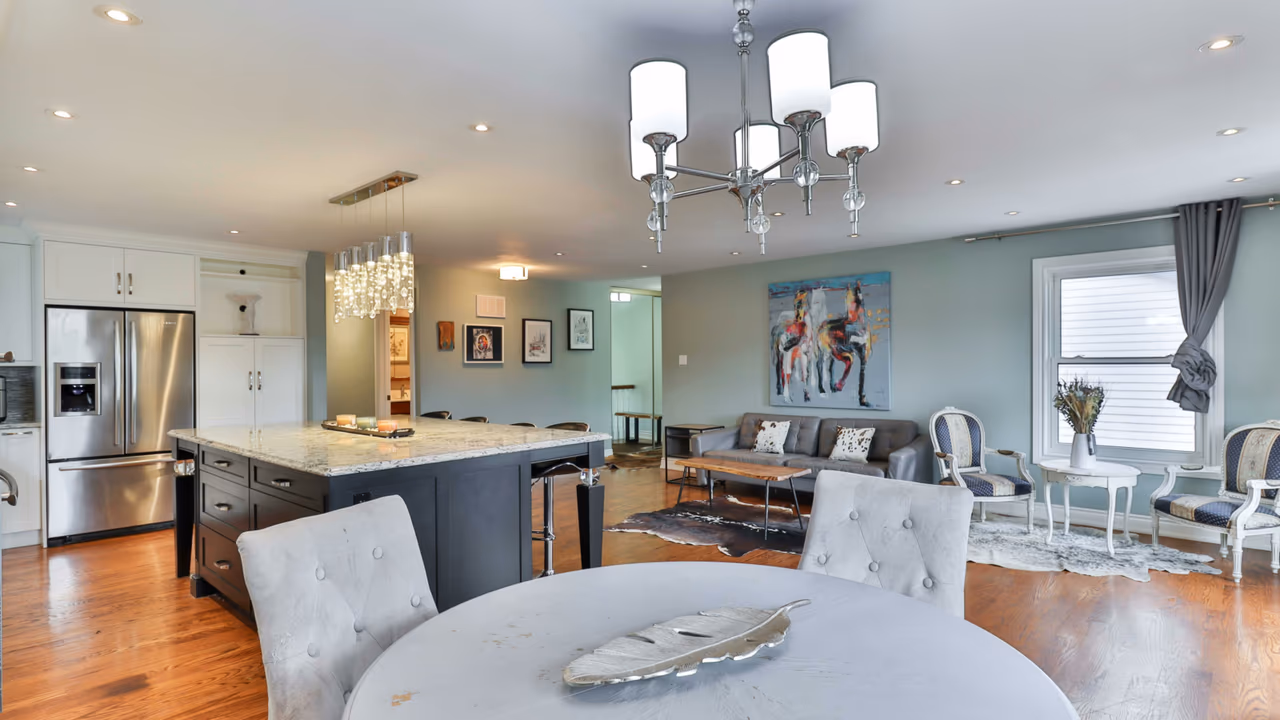 Modern open-concept kitchen and living room interior.