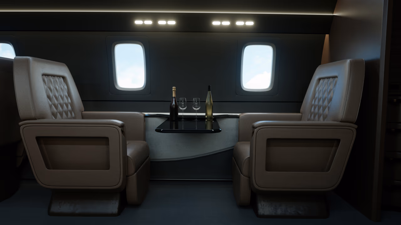 Luxury airplane seats with wine and glasses on a table