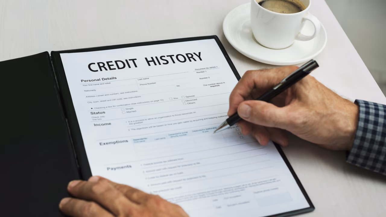 Young professional reviewing credit reports and building credit score from scratch