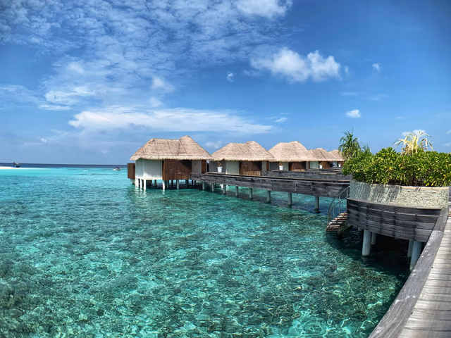 Coastal Retreat: Overwater Vs. Beachfront Villas