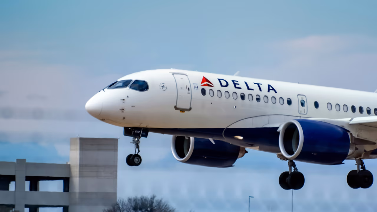 Delta airplane landing at airport.