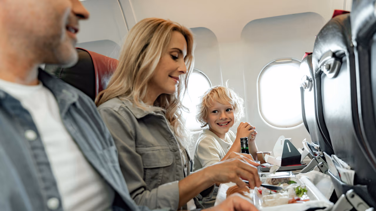 Family seated together on airplane flight