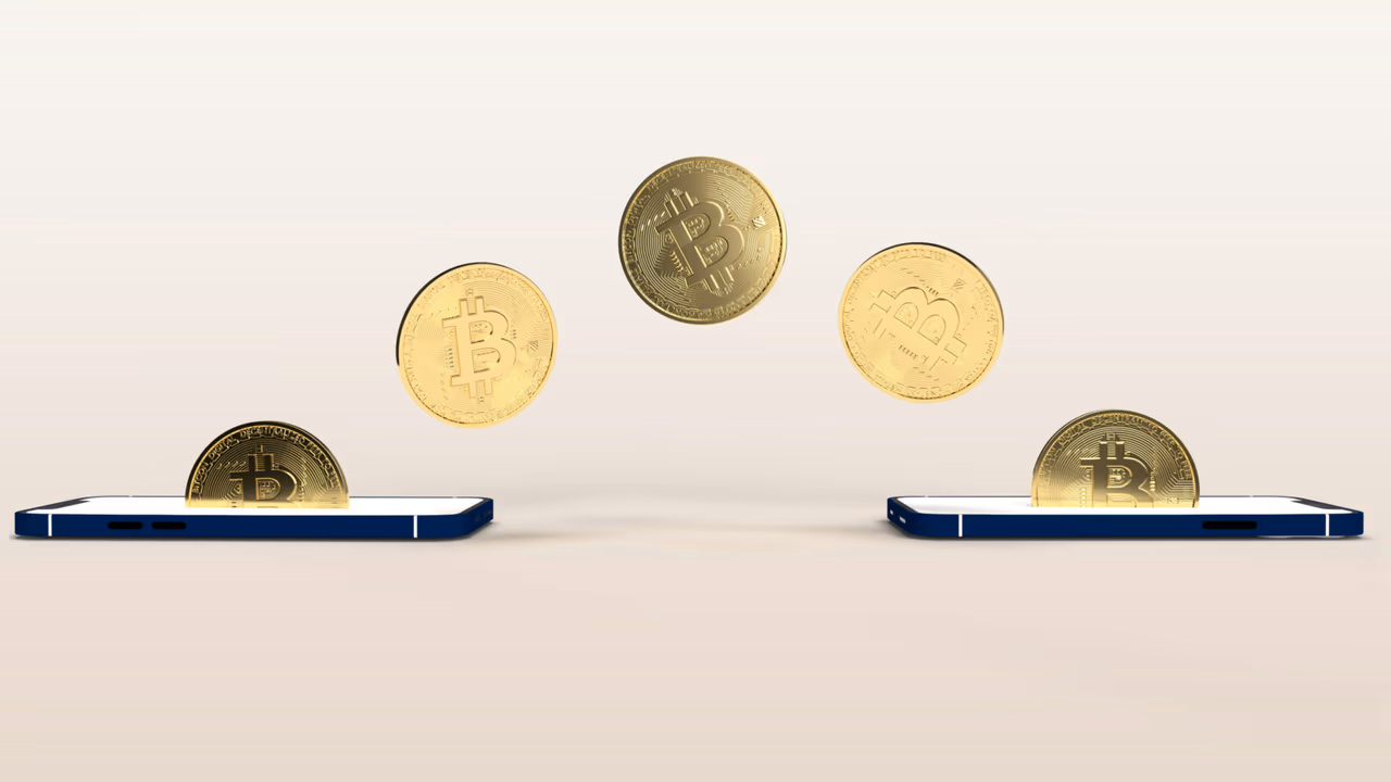 Gold bitcoin coins transferring through mobile phones