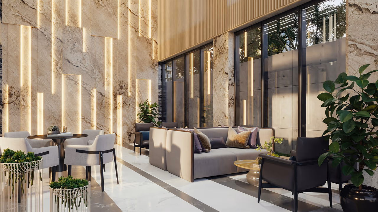 Modern luxury hotel lobby with marble walls and natural lighting