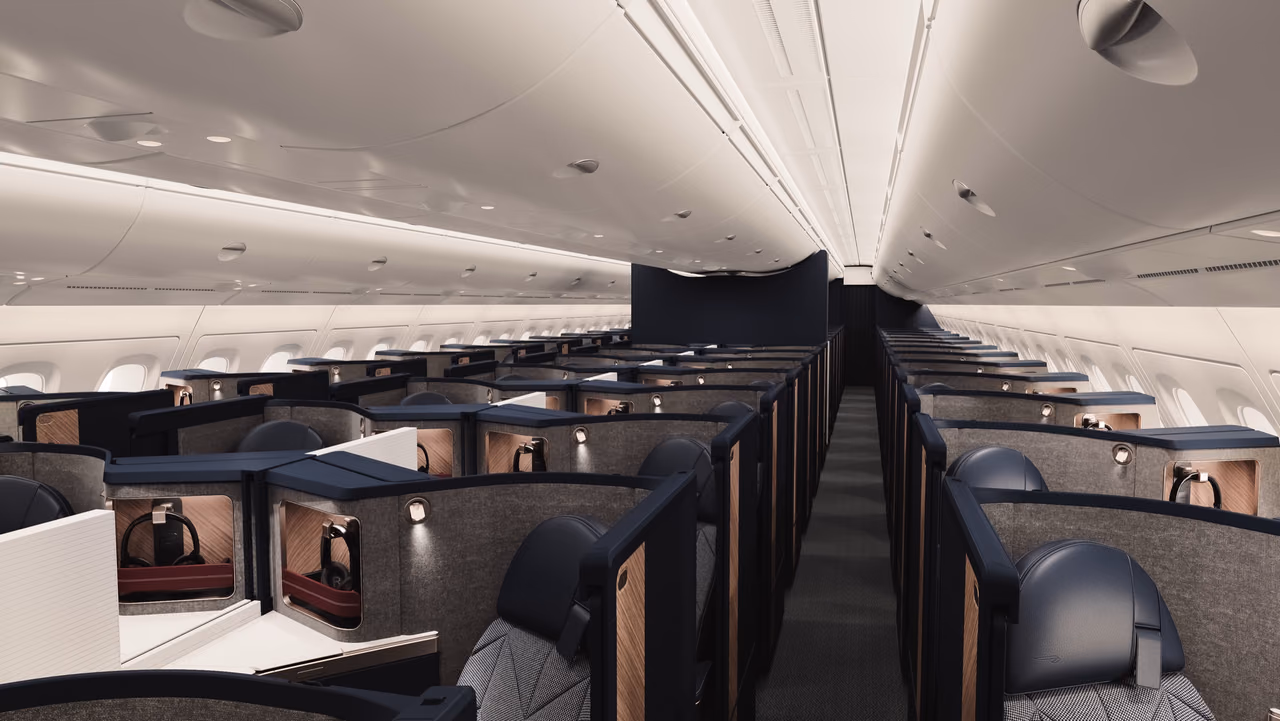 British Airways image of the refitted A380's upper deck Club World cabin, with rows of navy and gray Club Suites and wood-panel accents on either side of a center aisle